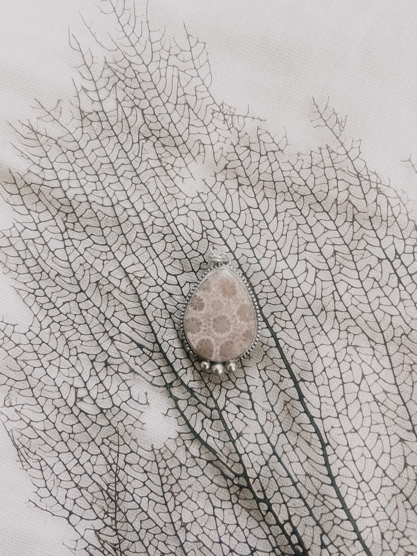 FOSSILISED CORAL PENDANT